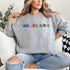 Introducing our newest addition to your wardrobe - the trendy graphic sweatshirt featuring colorful Winnipeg Scrabble Titles.